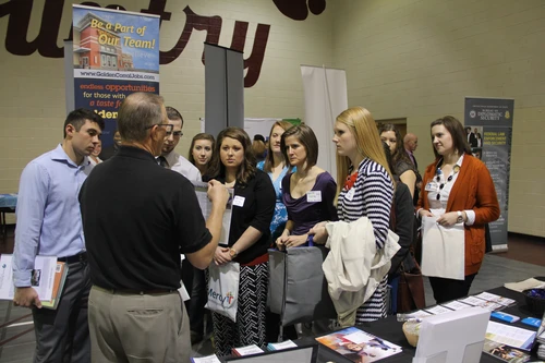 Employer speaking with students